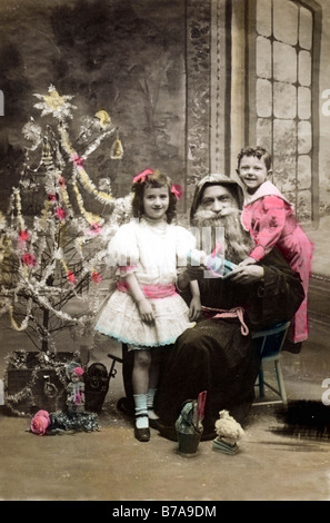 Photo historique, le Père Noël avec les enfants, ca. 1915 Banque D'Images