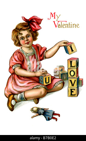 Girl in red dress avec lettre Jouets Mes Valentine je t'aime Banque D'Images