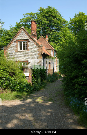 Un silex et brique rouge, maison typique du genre à être trouvés à Norfolk. UK. Banque D'Images