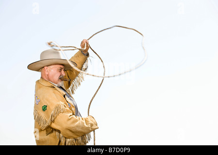 Un cowboy de lancer un lasso Banque D'Images