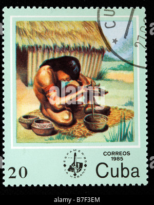 Le feu, la vie des hommes primitifs savage primeval préhistorique, timbre-poste, Cuba, 1985 Banque D'Images