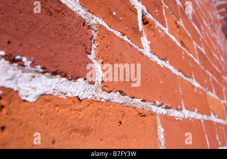Old weathered mur de brique rouge, détail d'arrière-plan Banque D'Images