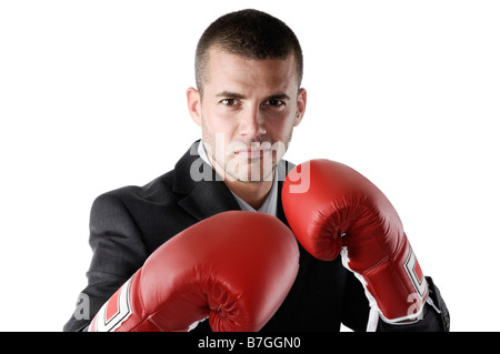 Businessman wearing boxing gloves Banque D'Images