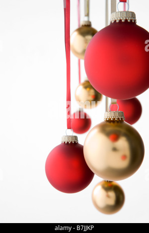 Groupe des décorations de Noël rouge et or Banque D'Images