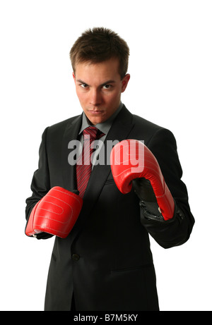 Young businessman wearing boxing gloves isolated on white Banque D'Images