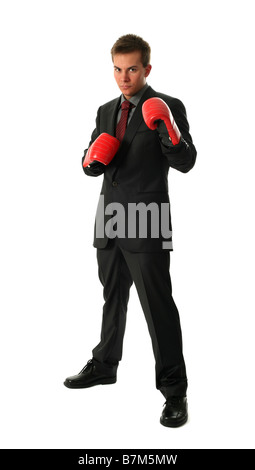 Young businessman wearing boxing gloves isolated on white Banque D'Images