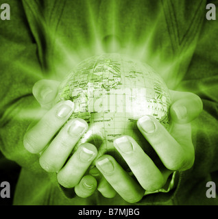 Globe in a girl's hands macro image Banque D'Images