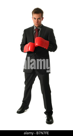 Young businessman wearing boxing gloves isolated on white Banque D'Images