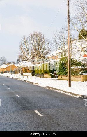 Claire grincées résidentiel route dégagé des prix rue Lane dans la Neige Neige Reigate Surrey après uk Banque D'Images