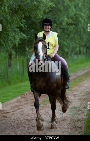 Femme rider en compétition dans l'endurance sport Banque D'Images