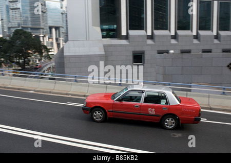 Taxi dans le centre de Hong Kong, Chine Banque D'Images