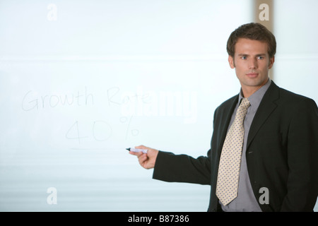 Businessman giving presentation Banque D'Images