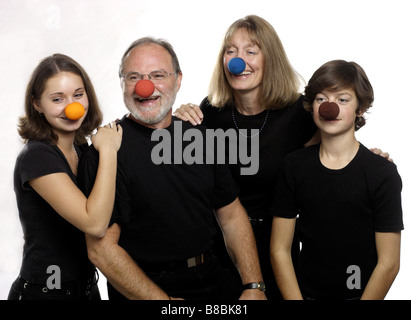 Family Wearing Rubber Nez de clown Banque D'Images