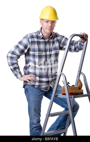 Studio photo de plein isolé un jeune artisan sur une échelle Banque D'Images Studio photo de plein isolé un jeune artisan sur une échelle Banque D'Images