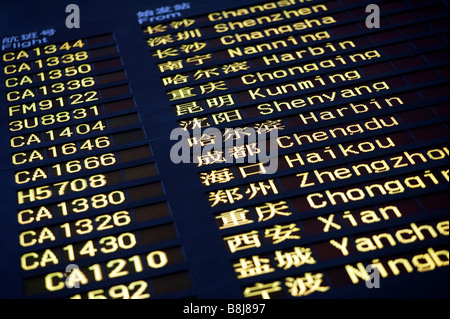 Les arrivées des vols d'information de vol de la carte d'affichage électronique au nouveau terminal de l'aéroport de Beijing 2009 La Chine 3 Banque D'Images