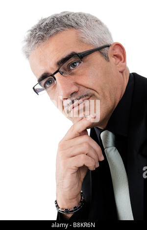 Aux cheveux gris à maturité à la pensée créative homme isolé sur fond blanc Banque D'Images