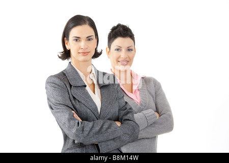 Happy young businesswomen smiling isolé sur fond blanc Banque D'Images