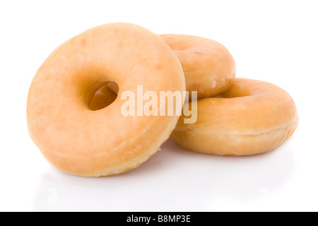 Trois donuts ou beignets empilé isolated on white Banque D'Images