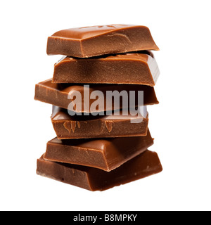 Pile de pièces en chocolat dentelle sur fond blanc Banque D'Images