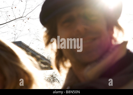 Close up of blurred smiling man with hat Banque D'Images