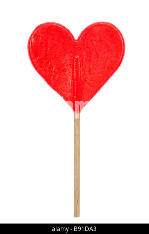 Sucette en forme de coeur rouge isolé sur fond blanc Banque D'Images