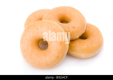 Trois donuts ou beignets empilé isolated on white Banque D'Images