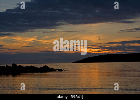 Coucher du Soleil à Port Logan à Dumfries and Galloway, au sud-ouest de l'Écosse, Royaume-Uni Banque D'Images