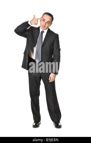 Businessman in a suit gesturing suicide isolé sur fond blanc Banque D'Images