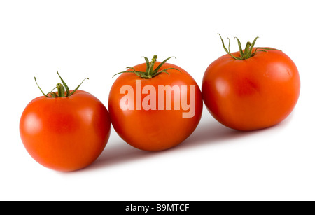 Les trois rouges tomtoes sur fond blanc Banque D'Images