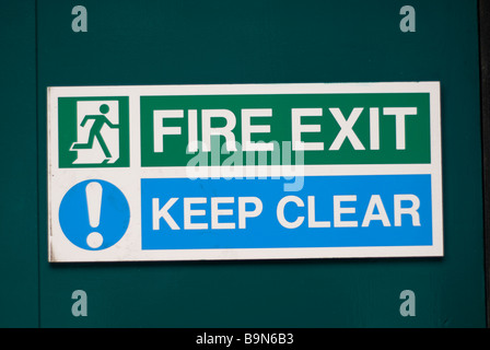 Rester à l'écart fire exit sign centre de Manchester UK Banque D'Images