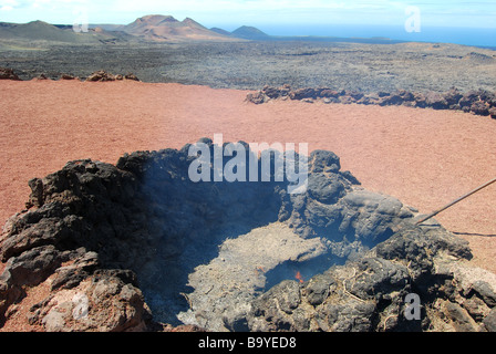 Trou de feu, Islote de Hilario, le Parc National de Timanfaya, Lanzarote, îles Canaries, Espagne Banque D'Images