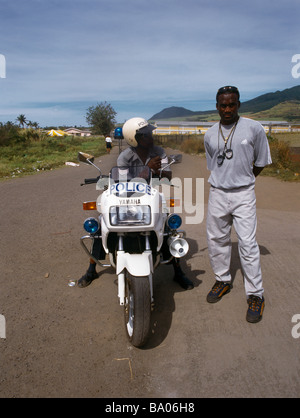 St Kitts Basseterre Enseignant Beechwood policier à moto Police Bike Banque D'Images
