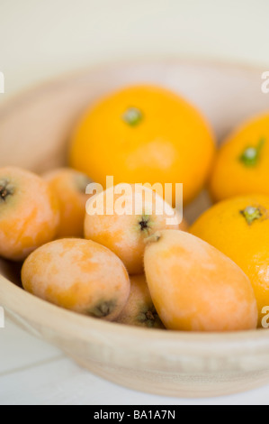 Loquat et orange Banque D'Images