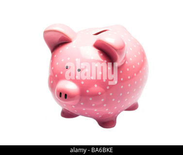 Pink piggy bank avec des taches blanches sur fond blanc Banque D'Images