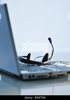 Casque sur ordinateur portable Banque D'Images