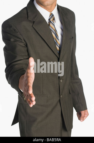 Businessman offrant une poignée de main Banque D'Images
