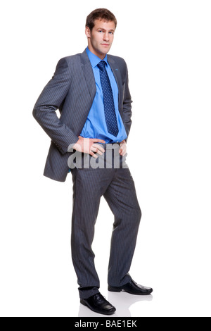 Tourné sur toute la longueur d'un homme d'affaires portant un costume gris pinstripe isolé sur fond blanc Banque D'Images