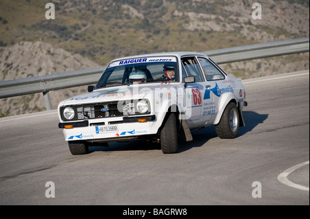 White 1975 Ford Escort classic sports car racing in the Classic rallye de voitures Majorque Banque D'Images