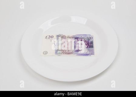 Vingt livres billet sur une plaque blanche Banque D'Images