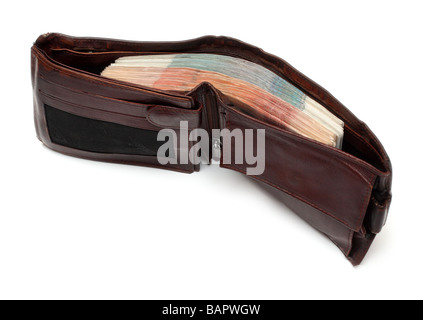 Sac à main marron avec de gros lot de billets isolated on white