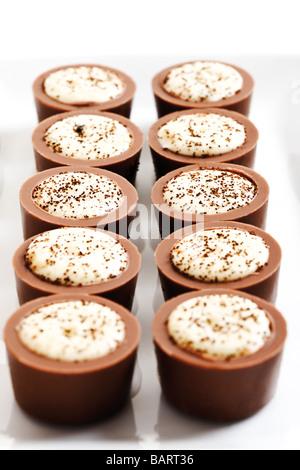 Les pralines dans une rangée Banque D'Images