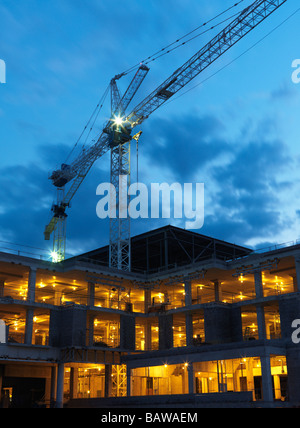Grues sur un chantier de construction Banque D'Images