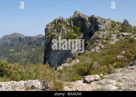 Watchtower, troglodytes Talaia de la Foradada, Sierra de la Forada, Province d'Alicante, Communauté Valencienne, Espagne Banque D'Images