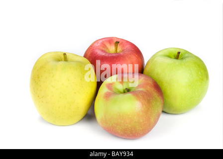 Quatre pommes montrent la variété de jaune à la Granny Smith à une pomme rouge Banque D'Images