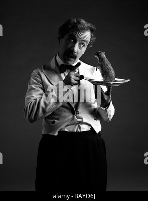 Andrew Sachs que Manuel avec son animal de rat Banque D'Images