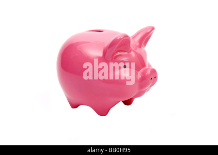 Tirelire cochon rose sur un fond blanc. Banque D'Images