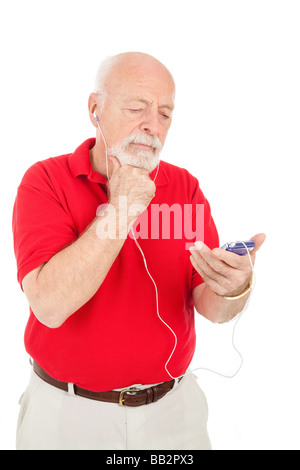Man avec un lecteur mp3 pour comprendre comment il travail isolated on white Banque D'Images
