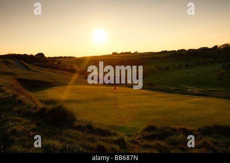 Coucher de soleil sur Langland Bay Golf Course, la péninsule de Gower, West Glamorgan, Pays de Galles, Royaume-Uni Banque D'Images