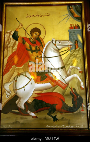 Peinture de St Georges terrassant le dragon sur le mur dans la nouvelle église, le monastère de St George près de Krak des chevaliers en Syrie Banque D'Images