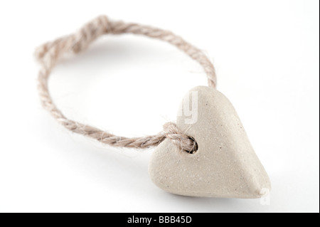 Coeur de pierre sur une chaîne Banque D'Images